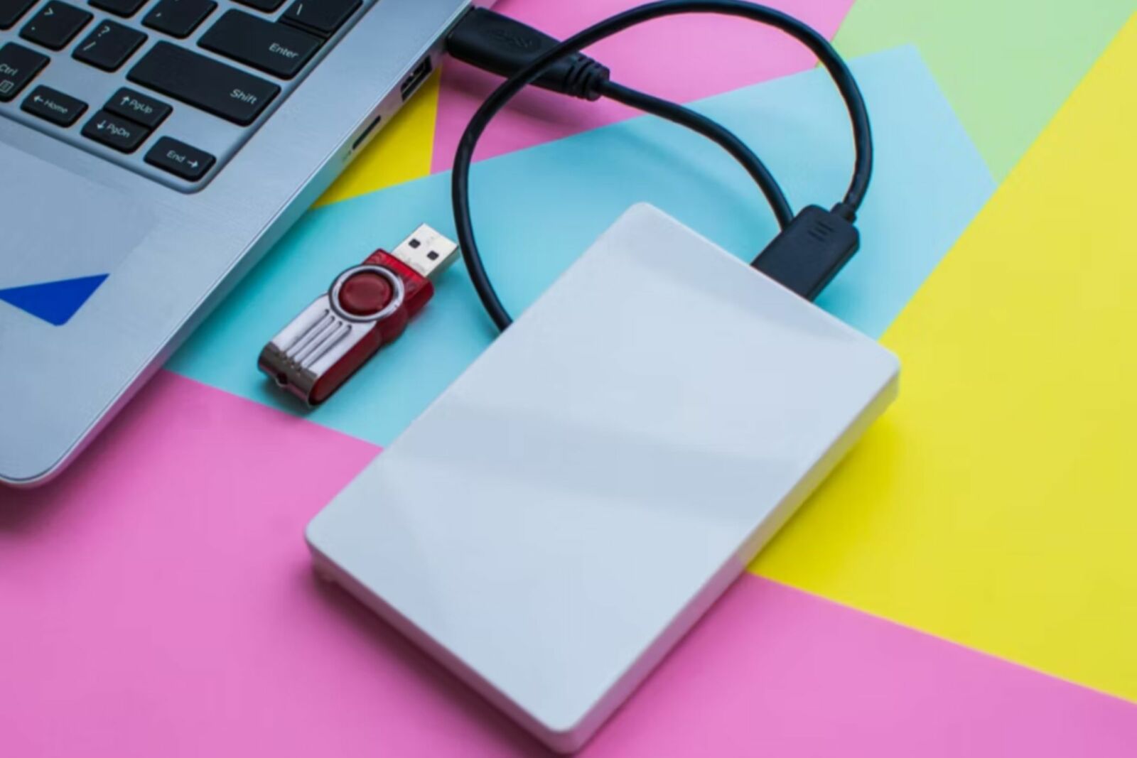 flash drive and an external drive connected to a laptop