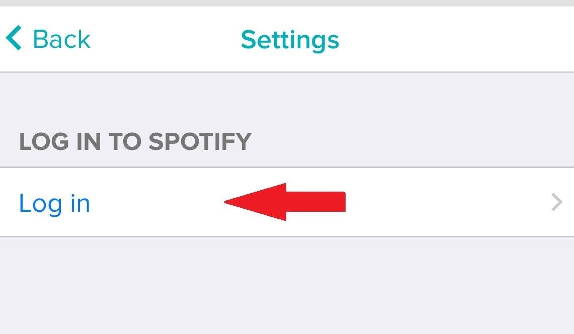 Log into Spotify on the Fitbit app.