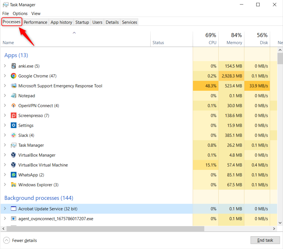 Task Manager showing running applications and processes