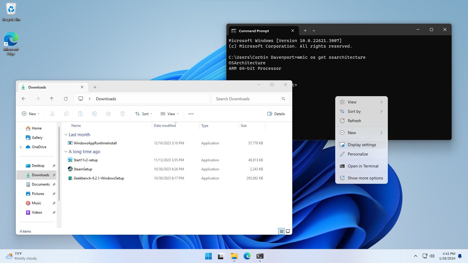 Desktop with open folders and command prompt showing an ARM CPU.