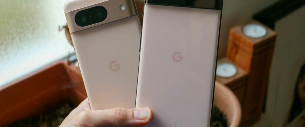 hand holding two google pixel phones