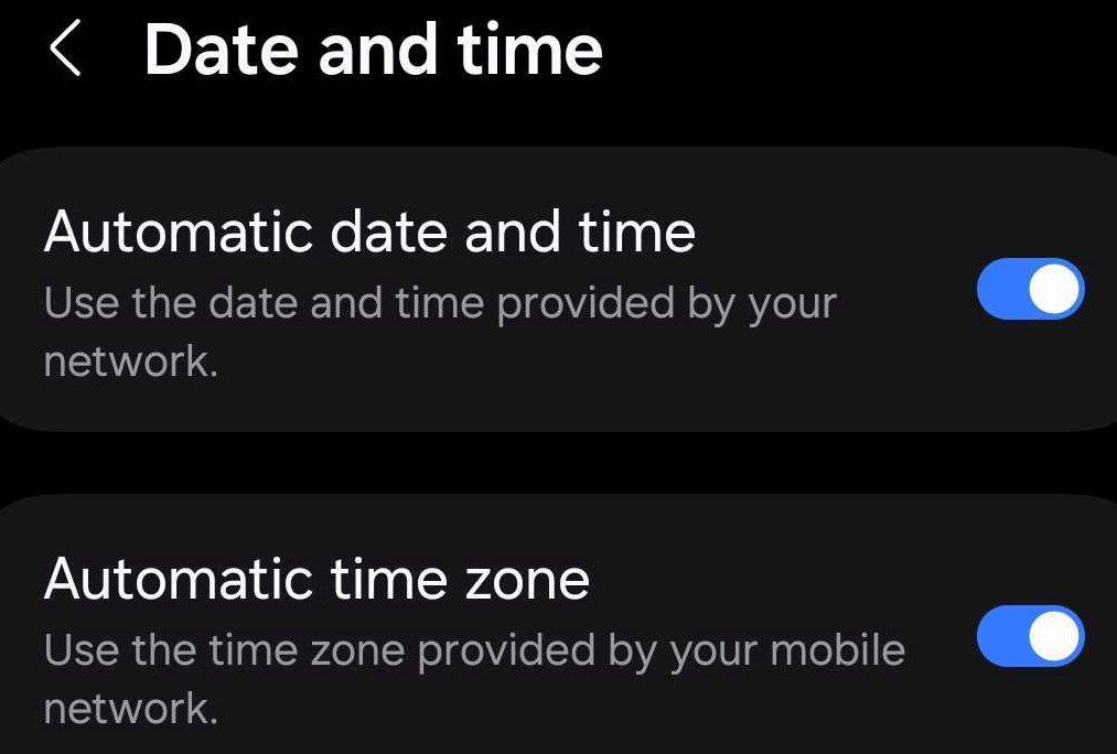 Enabling the automatic date and time and time zone settings on Android.