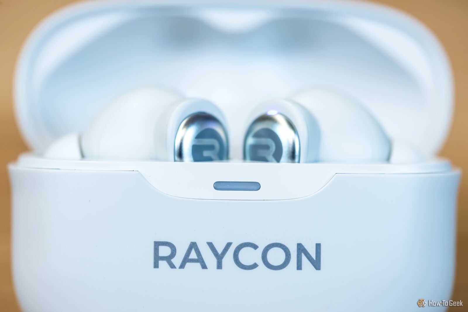 A pair of Raycon Everyday Earbuds Pro in their case