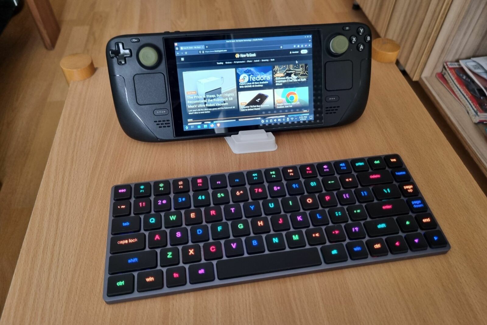 A Steam Deck with a low-profile keyboard in front of it.