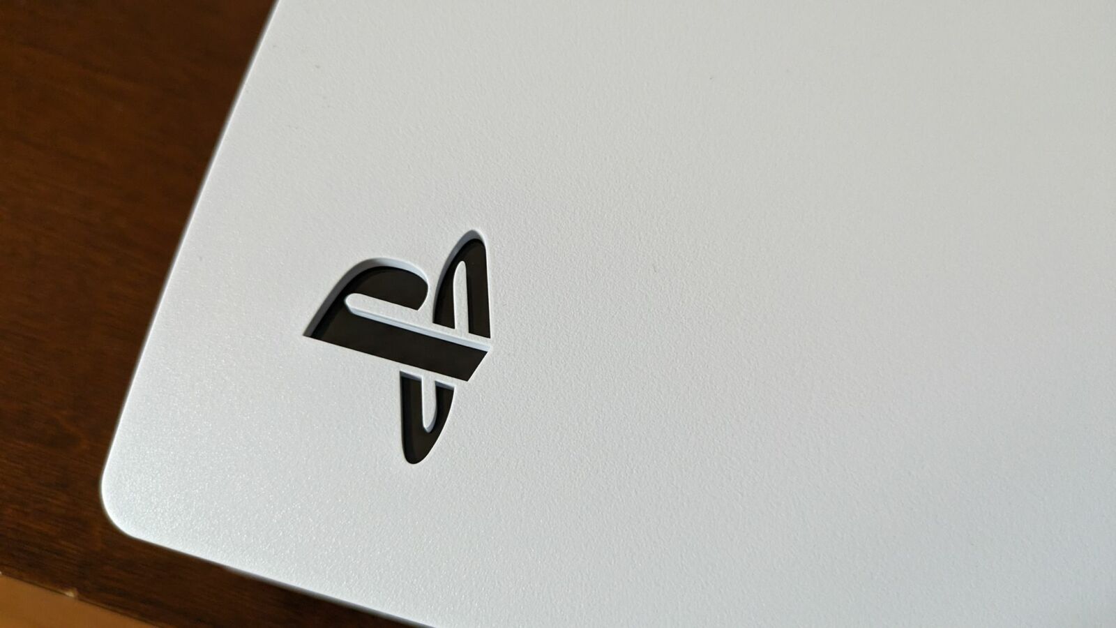 The PS5 logo on a PlayStation 5's chassis.