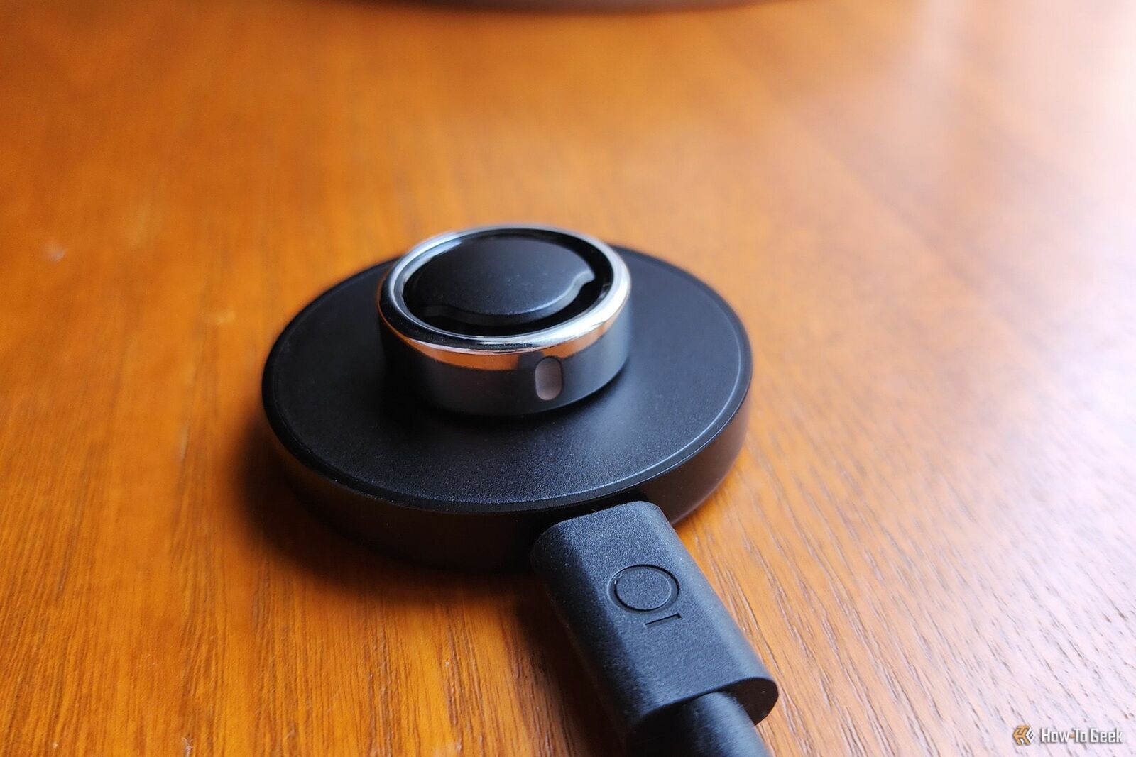 A close up of the Oura Ring Generation 3 on its charger.